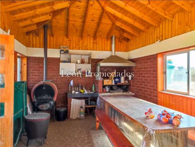 vendo parcela con piscina