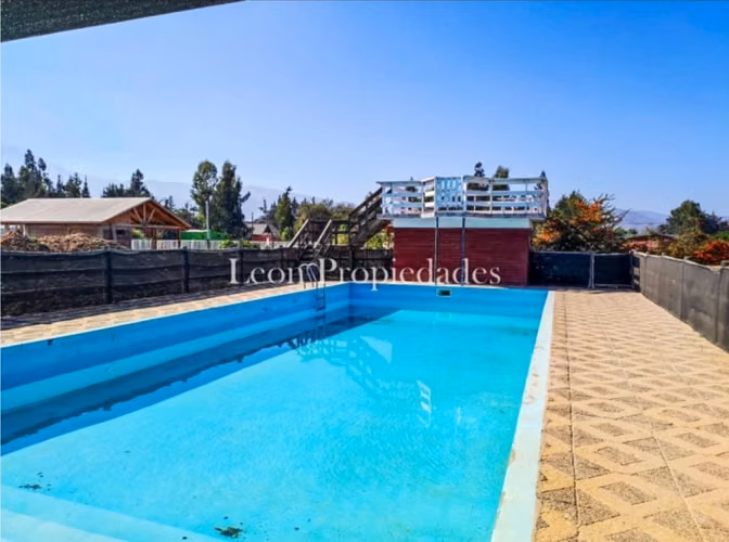 vendo parcela con piscina