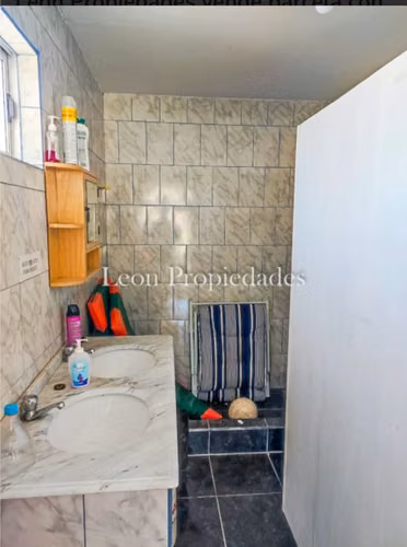 vendo parcela con piscina