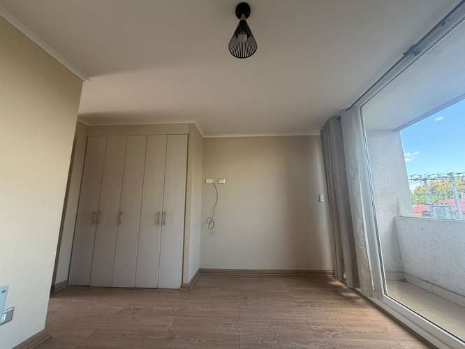 ARRIENDO DEPARTAMENTO CON PATIO EN EDIFICIO CENTRO I - Imagen 10