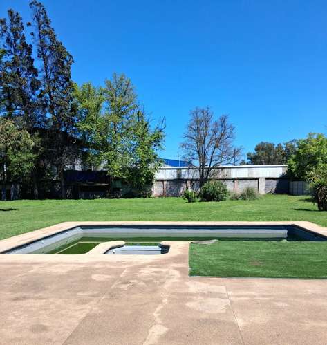 Por apuro, bajo la tasación: parcela 1,8 ha con casa, piscina y nogales, Buin