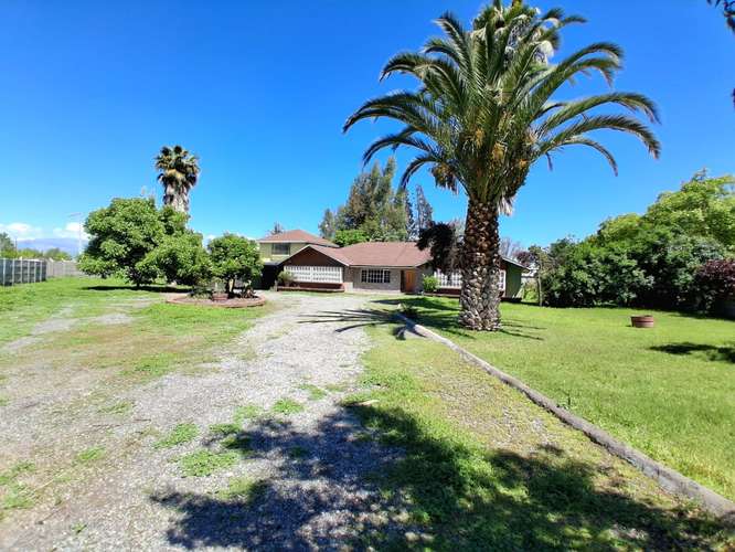 Oportunidad bajo tasación: parcela 1,8 ha con casa, piscina y nogales, Buin