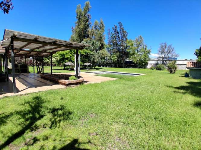 Por apuro, bajo la tasación: parcela 1,8 ha con casa, piscina y nogales, Buin