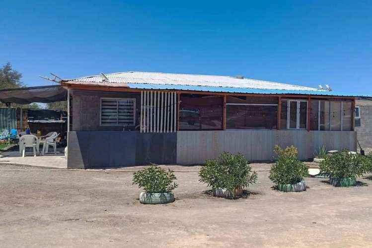 Parcela 5.300 m² con casa de 4 dormitorios – La Tirana