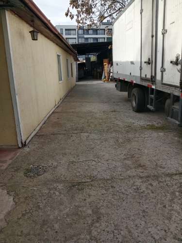 Casa con 3 deptos independientes y galpón en La Florida - Imagen 17