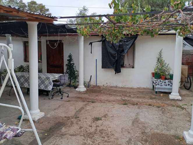 Casa con 3 deptos independientes y galpón en La Florida - Imagen 9
