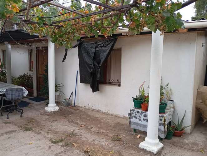Casa con 3 deptos independientes y galpón en La Florida - Imagen 10
