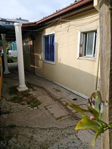 Casa con 3 deptos independientes y galpón en La Florida - Imagen 5
