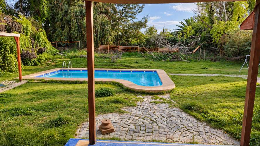 AMPLIA CASA 4D3B PISCINA QUINCHO Y JARDIN OASIS  EN MACHALI