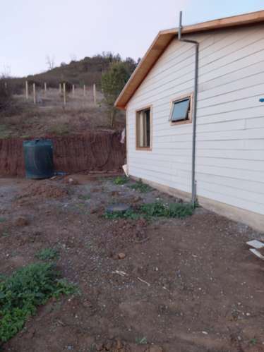 PARCELA CON CASA