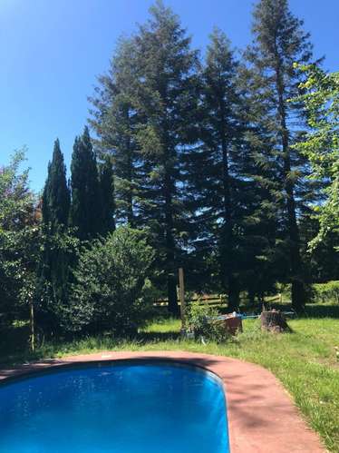 VENDO PARCELA URBANA CON CASA EN UNIHUE SANTA JUAN