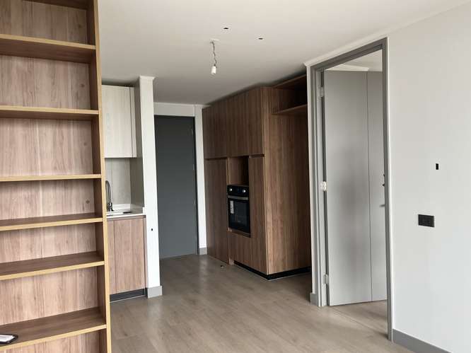 NUEVO UN DORMITORIO, ESTACIONAMIENTO Y BODEGA