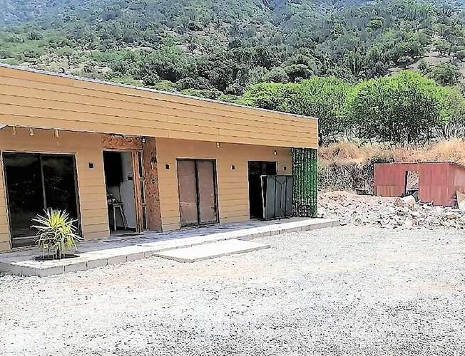 En venta, hermosa parcela de 6.021 m2. con casa y piscina en el tranquilo sector de Lo Rojas, La Cruz. 105 M$.