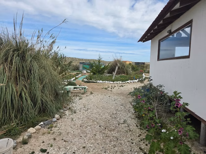 Parcela con casa y cabañas 2 cabañas. - -Todo amoblado