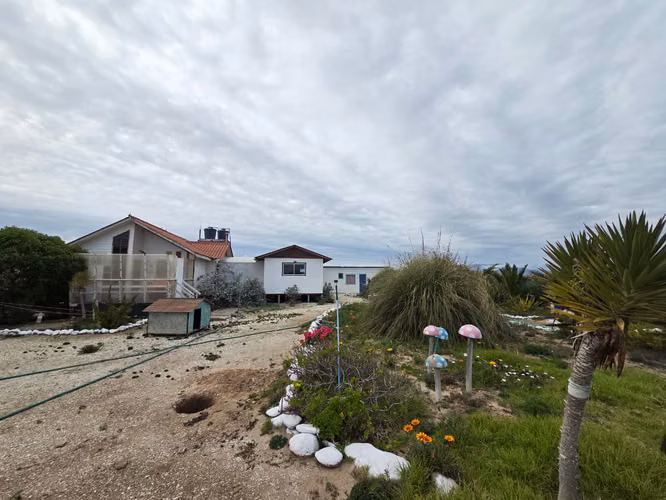 Parcela con casa y cabañas 2 cabañas. - -Todo amoblado