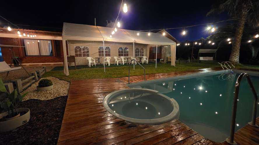 VENTA DE PARCELA CON CASA  PISCINA Y QUINCHO  DOS HERMANAS