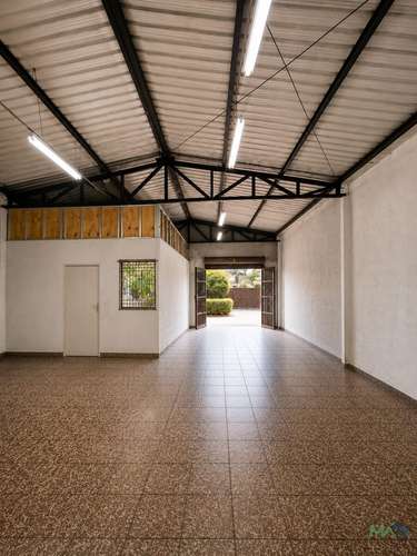 Propiedad Comercial en Av. Eyzaguirre con Santo Domingo, Puente Alto | Casa y Galpones