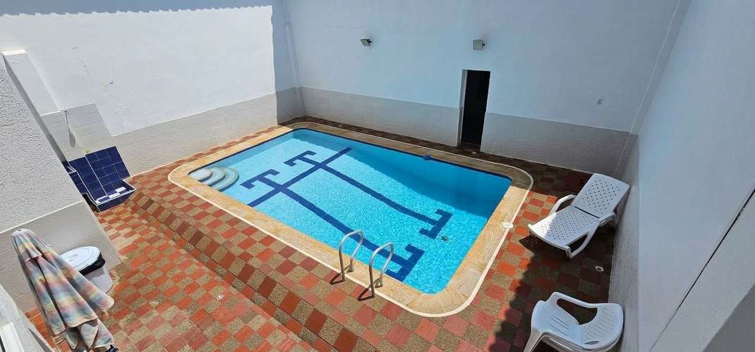 Casa con piscina en el centro de Melgar | 7 habitaciones, capacidad para 35 personas e ideal para inversión turística