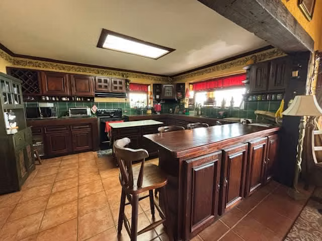Venta de terreno con casa de una planta. Llano Grande, Cartago (SV)