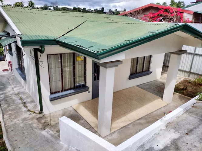 House for Sale in Grecia with Spacious Garden, Fruit Trees, and Pet-Friendly Spaces