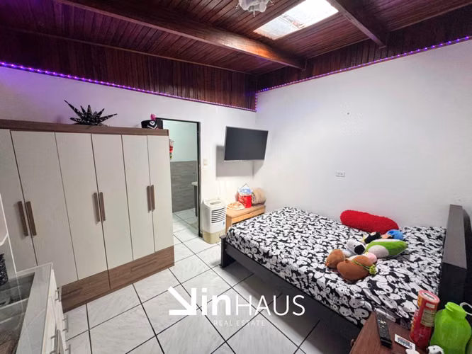 Casa con lote de 969 m2 de uso mixto en Patarrá, Desamparados -EU