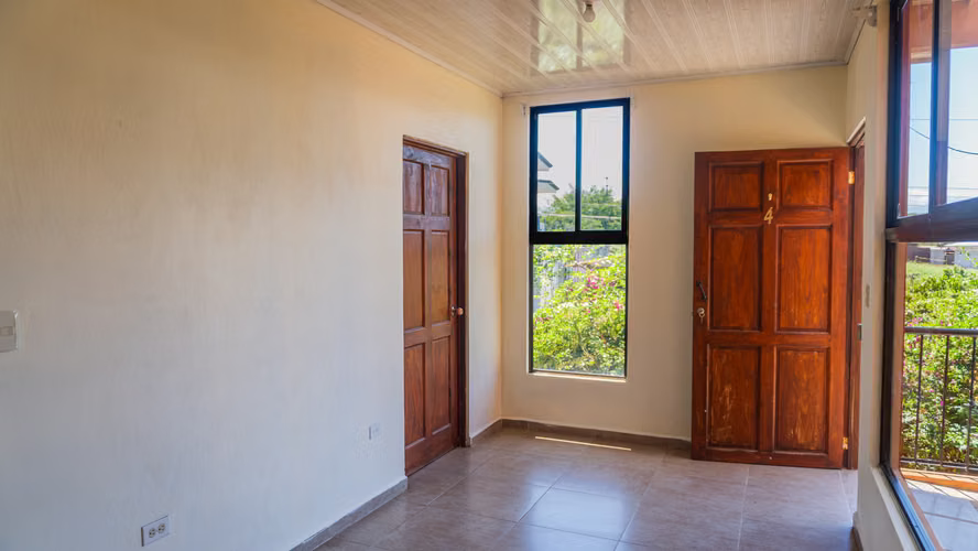 IMPORTANTE REBAJA • 2 HABITACIONES • 2 BAÑOS • PARQUEO TECHADO • ZONA VERDE