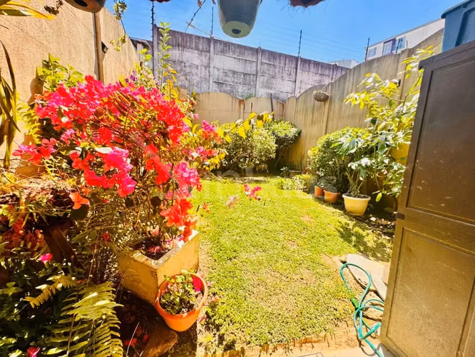 id # 42142En venta casa con habitación en planta baja y gran patio