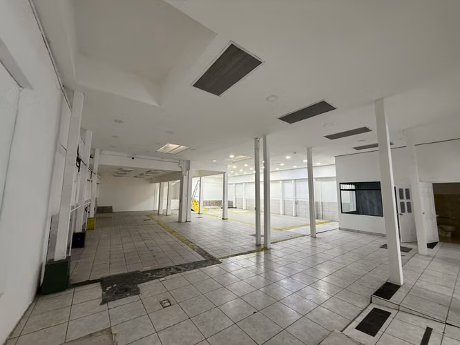 G.A. It is sold Building with factory of Sirops and Apartments, Heredia.