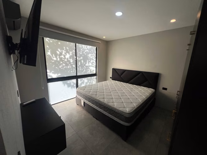 ¡Alquiler Único! Descubre la Exclusividad en este Apartamento Amoblado Contemporáneo.