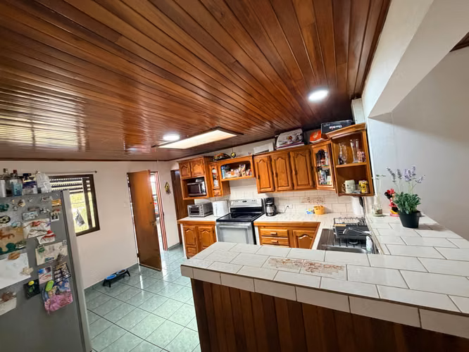 GI Casa de un solo nivel con amplio terreno en San Pedro de Barva. GI 26-1973.