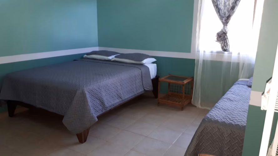 Oportunidad de 2 Lotes Costeros con Casa Cerca de Jacó