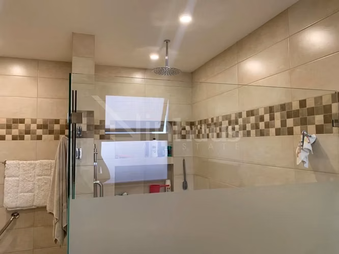 Venta de casa de una planta en condominio en Santa Ana