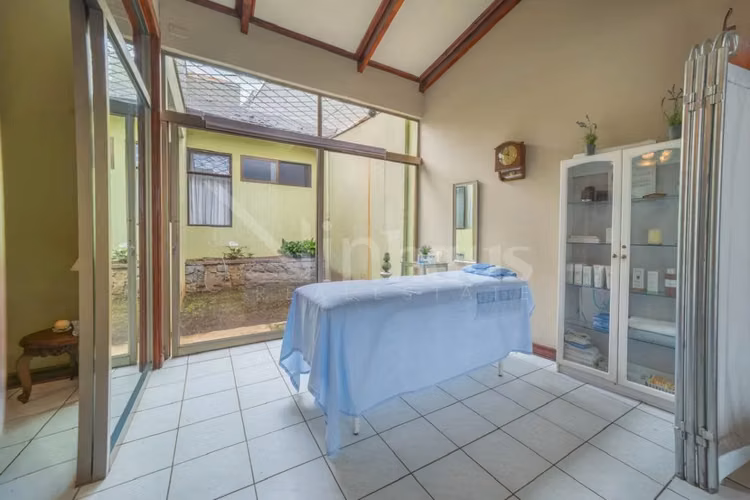 Venta de casa independiente de una planta en Uruca - Imagen 2