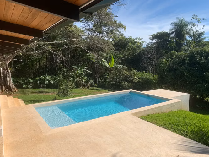 Casa de 2 dormitorios con piscina con potencial de expansión: un santuario con estilo en Delicias, cerca de Montezuma. - Imagen 7