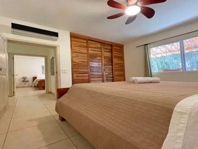 Casa de 2 dormitorios en excelente ubicación + 6 apartamentos de alquiler y piscina a pasos de la playa en el corazón de Santa Teresa - Imagen 14