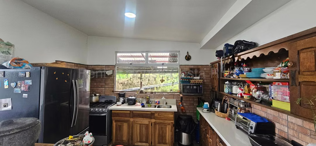 Venta de casa en lote de 1.765 m2 en San Isidro Heredia - Imagen 6