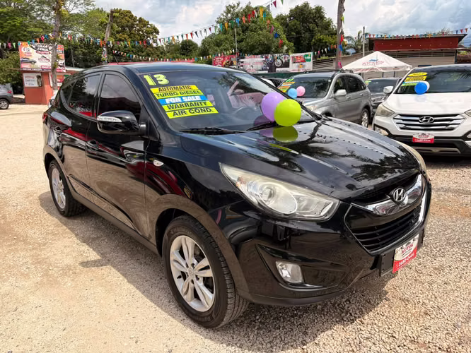 HYUNDAI TUCSON GLS-2013-AUTO-TDI-SHIFT TRONIC-4X2 8.275.000 - Imagen 4