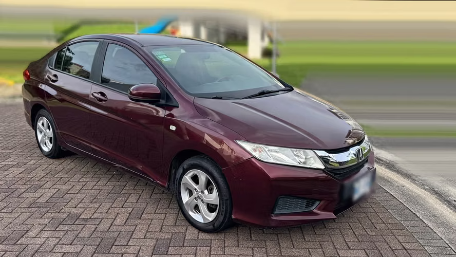 Honda City 2014 | Color Vino | 118,200 km | Precio ajustado por detalle de estéreo