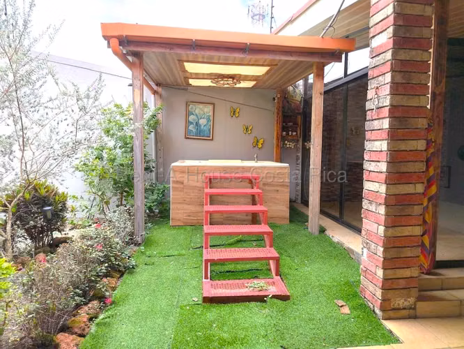 Casa en Venta en Mercedes Norte de Heredia - Espaciosa Una Planta con Jardines y Área Social - Imagen 17