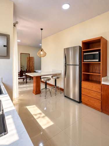 Apartamento de un ambiente AMUEBLADO, NUEVO, con jardín y acabados de lujo para alquiler en Grecia