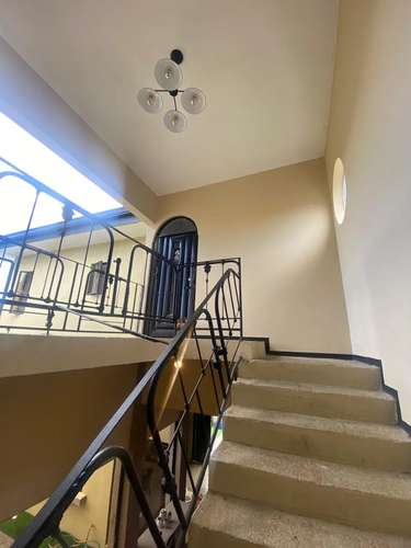 Elegante Casa Familiar con Amplio Patio y Vistas Verdes en San Ramón de La Unión - Imagen 6