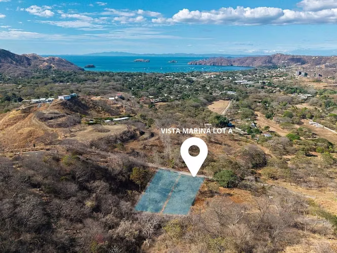 Vista Marina Lote A | Calle pavimentada, barrio residencial, con agua - Imagen 21