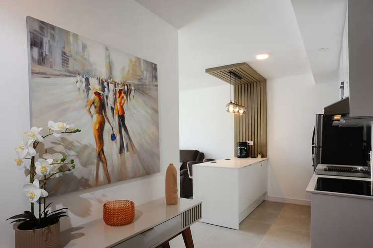 VENTA DE APARTAMENTO AMUEBLADO PARA INVERSIÓN DE 2 HABITACIONES CON PARQUEO - Imagen 12