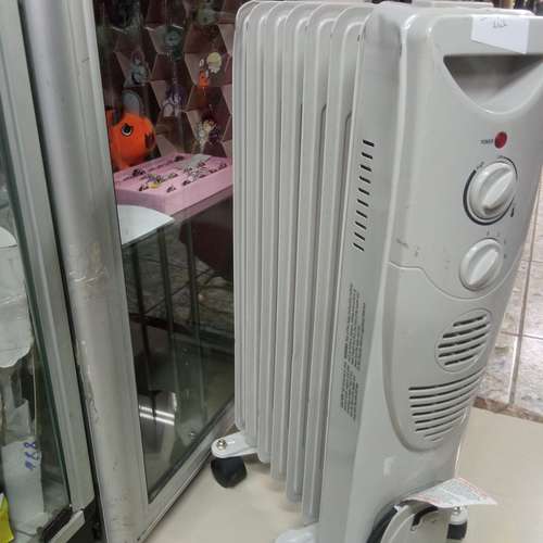 calentador hogar en aceite portatil con rodines cod3334 asch