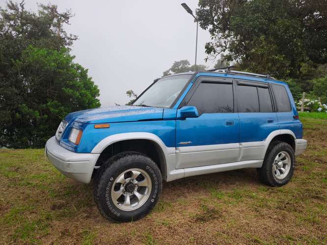 Suzuki Sidekick Sport modelo 96 4x4. Impecable- segundo dueño. Mantenimiento y Revisión técnica al día!!! - Imagen 4
