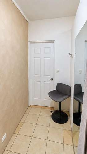 Local comercial en venta con contrato de arrendamiento vigente en Plaza Coral, Jacó centro