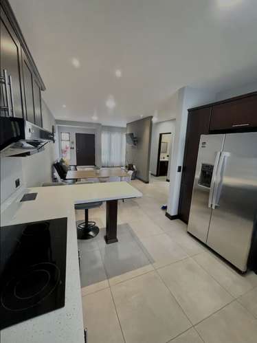 Casa espaciosa a estrenar en Condominio Hacienda El Coyol, Alajuela, con seguridad 24/7 y vista a las montañas
