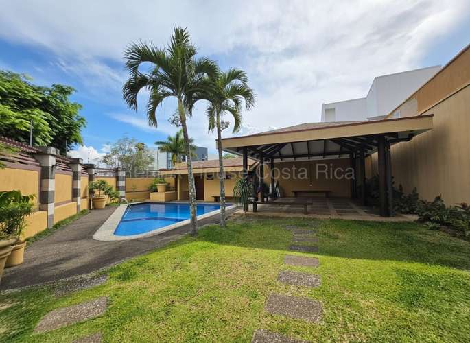 Exclusiva casa de 4 habitaciones en condominio con piscina en Cariari, Heredia. ¡Oportunidad única! - Imagen 19