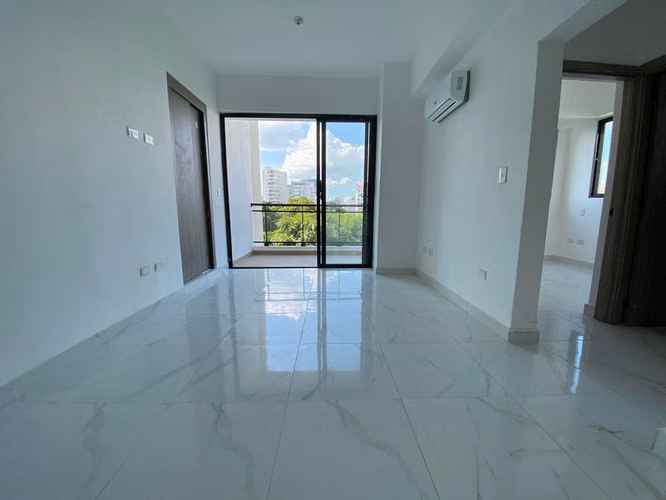 Apartamento de Inversión de 2 Habitaciones en Naco con Linea Blanca e Inquilino.