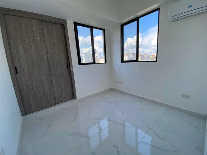 Apartamento de Inversión de 2 Habitaciones en Naco con Linea Blanca e Inquilino.